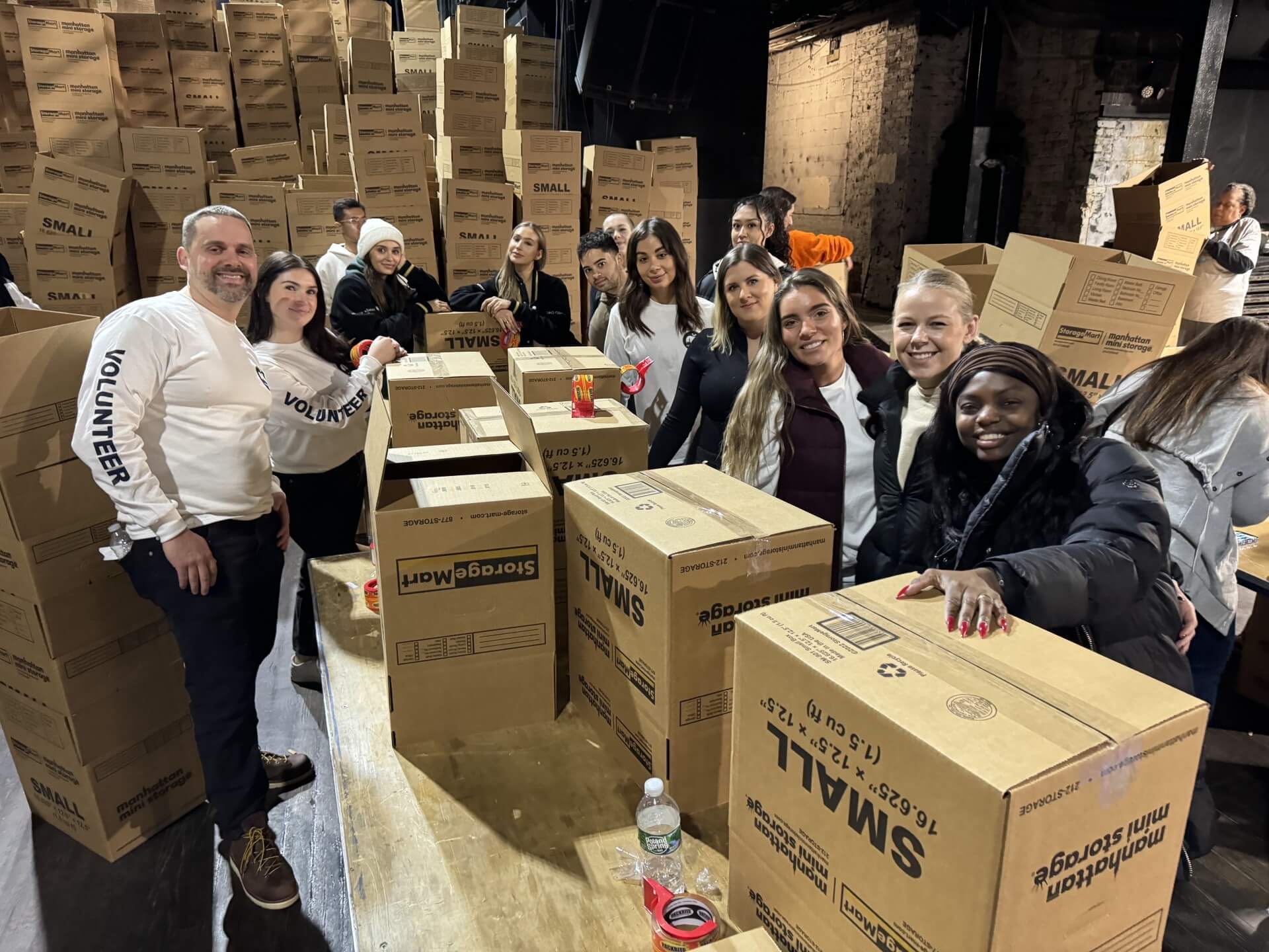 Holiday giving team and boxes